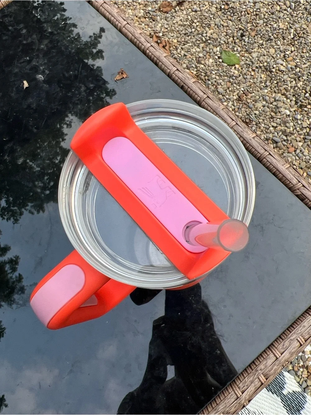 Bright orange with pink Stanley 30oz